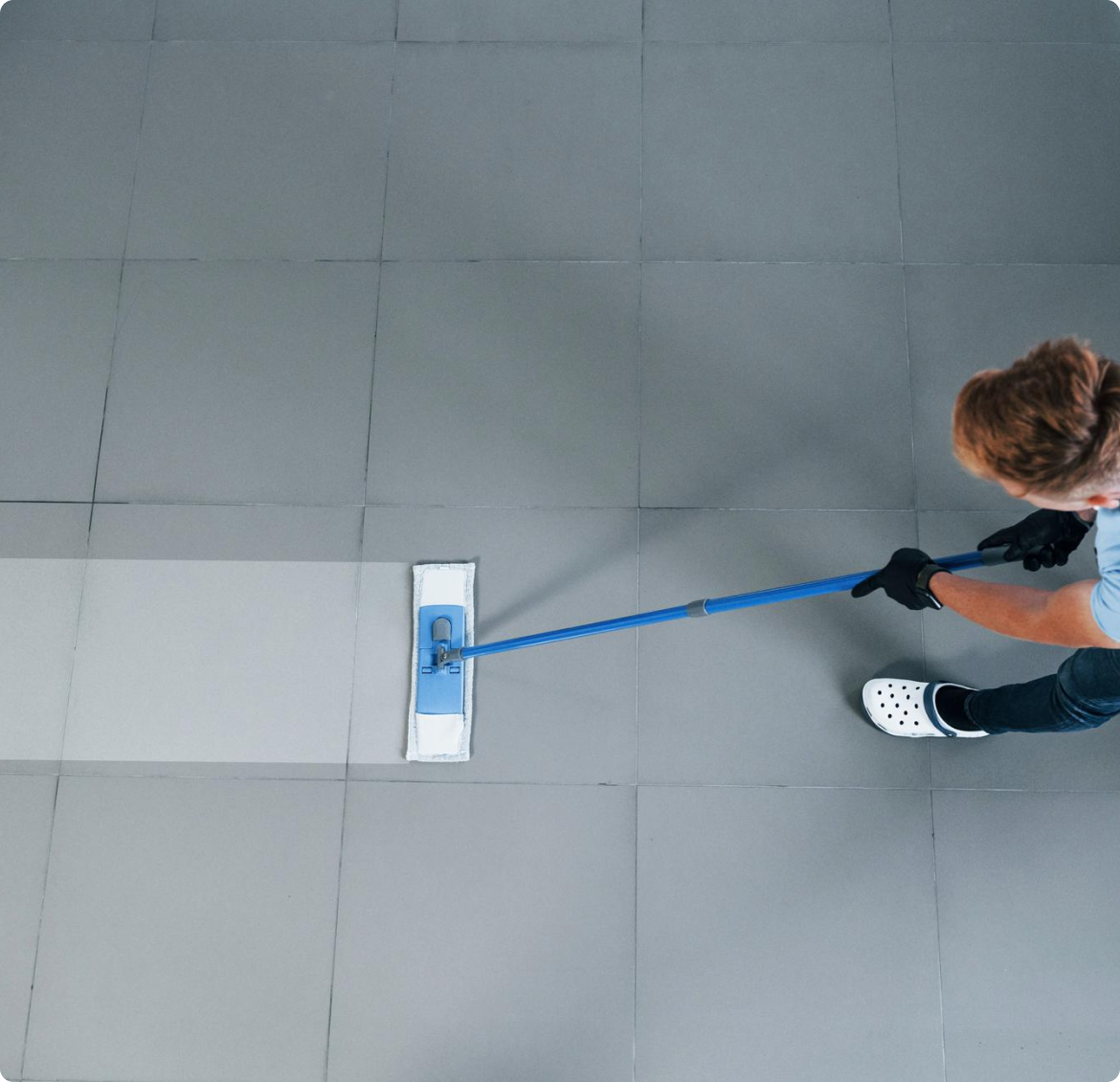 Benefits of Ceramic Coating for Floors Man mopping floor